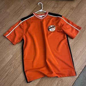 True Fan genuine merchandise. Large Jersey. 100% polyester orange & black